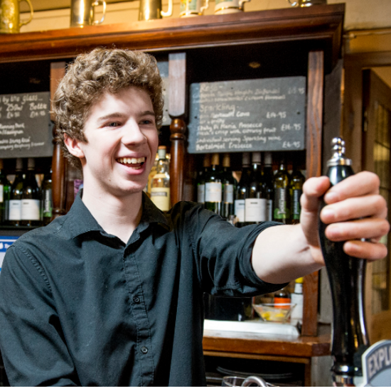 Man pulling a pint
