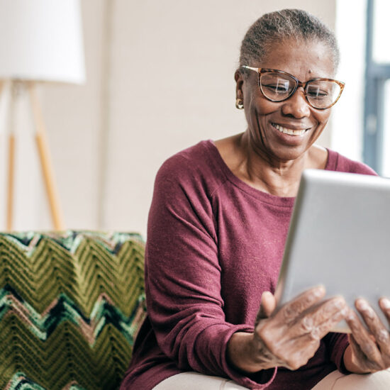 woman looking at ipad