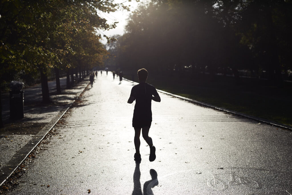 Silhouetted man runnng