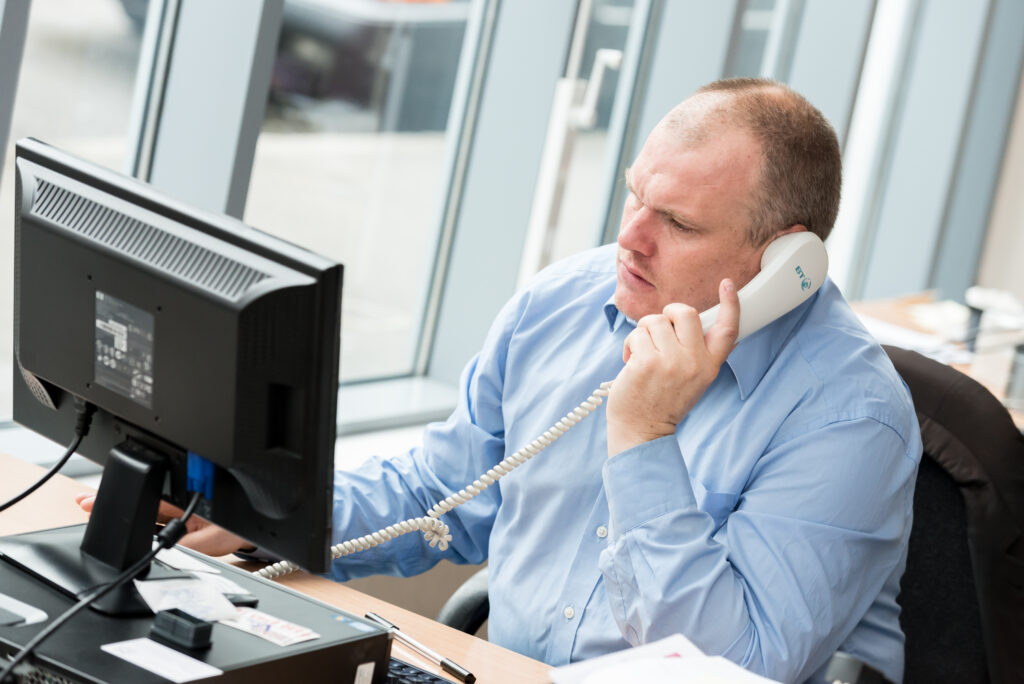 man on phone in office