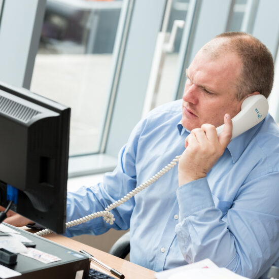 man on phone in office