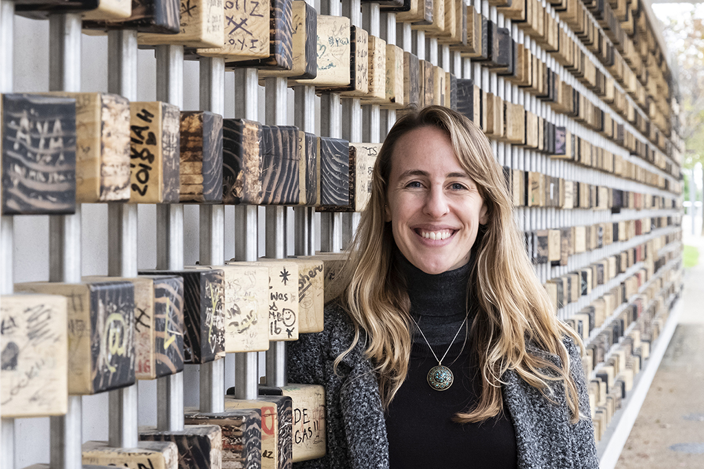 Anna Waldie leaning against a wall.