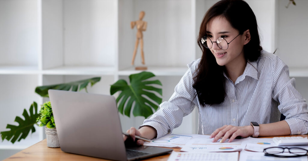 Asian woman working with laptop