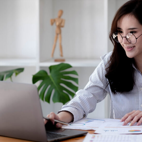 Asian woman working with laptop