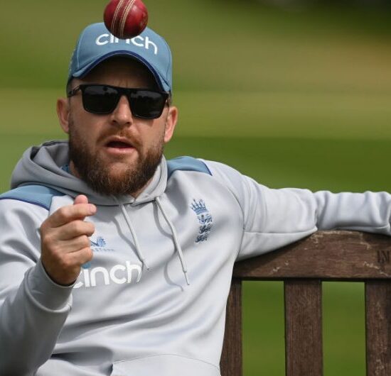 Baz Ball. A photo of Brendan McCullen tossing a cricket ball. Courtesy of Getty Images